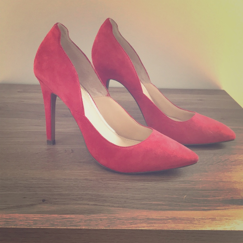 Red suede pumps